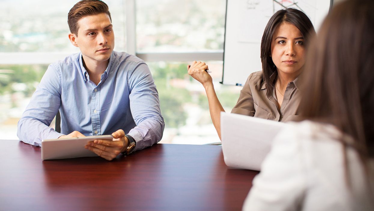 Hiring managers look at job candidate after the interview didn't go well