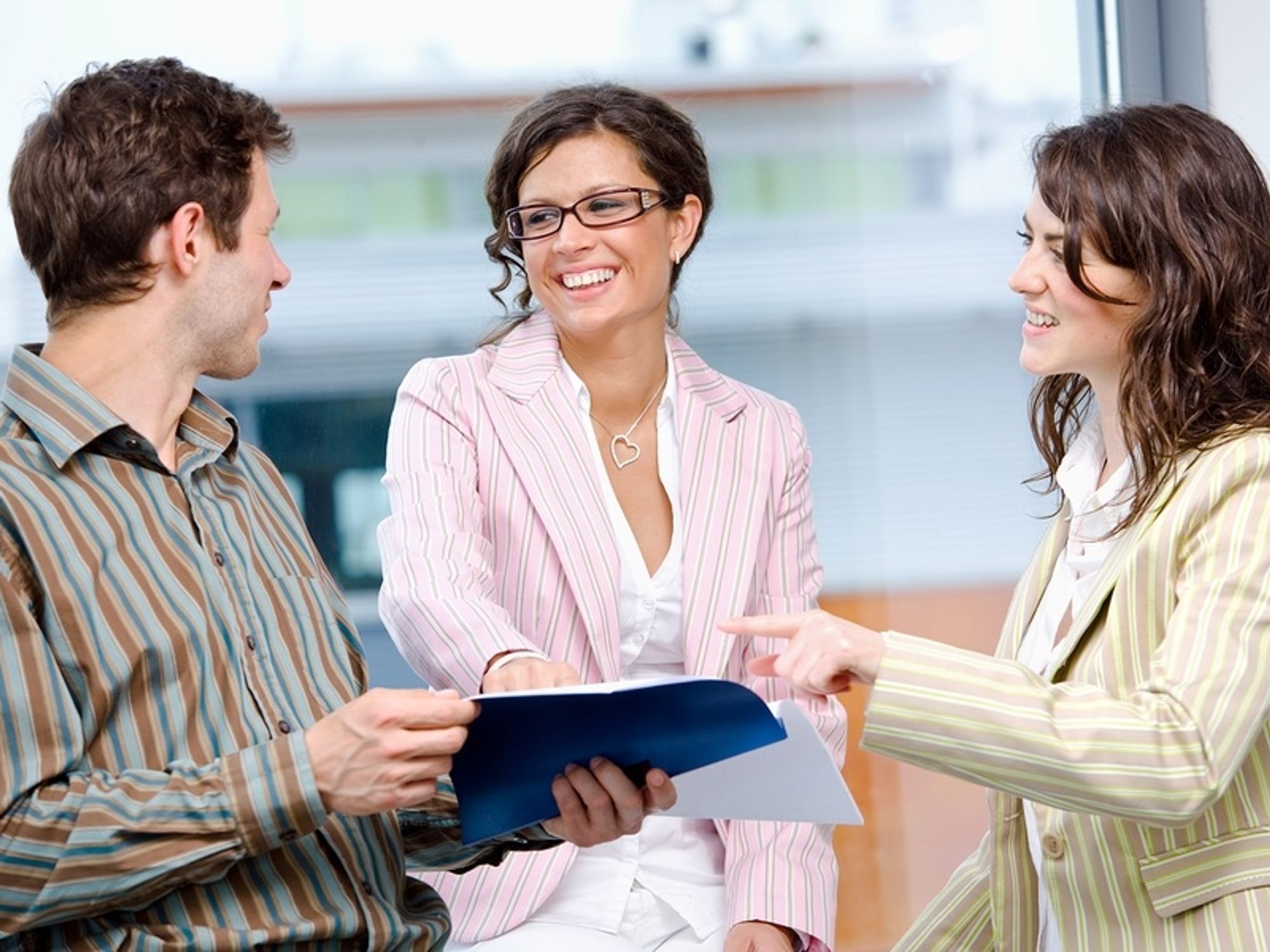 Human resources goes over an outplacement plan with an employee.