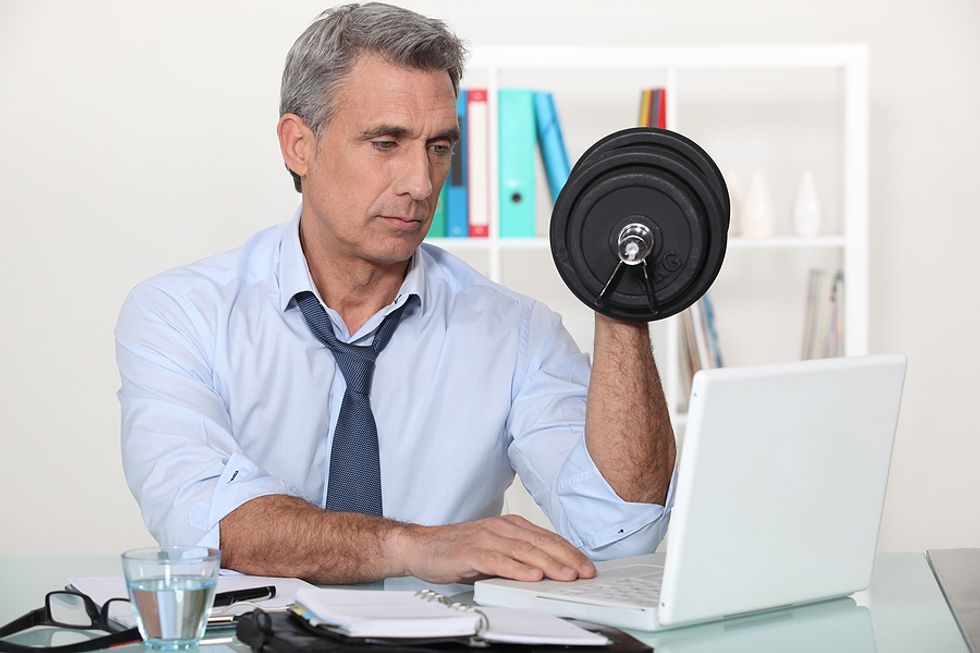 6 Workouts To Do At Your Desk
