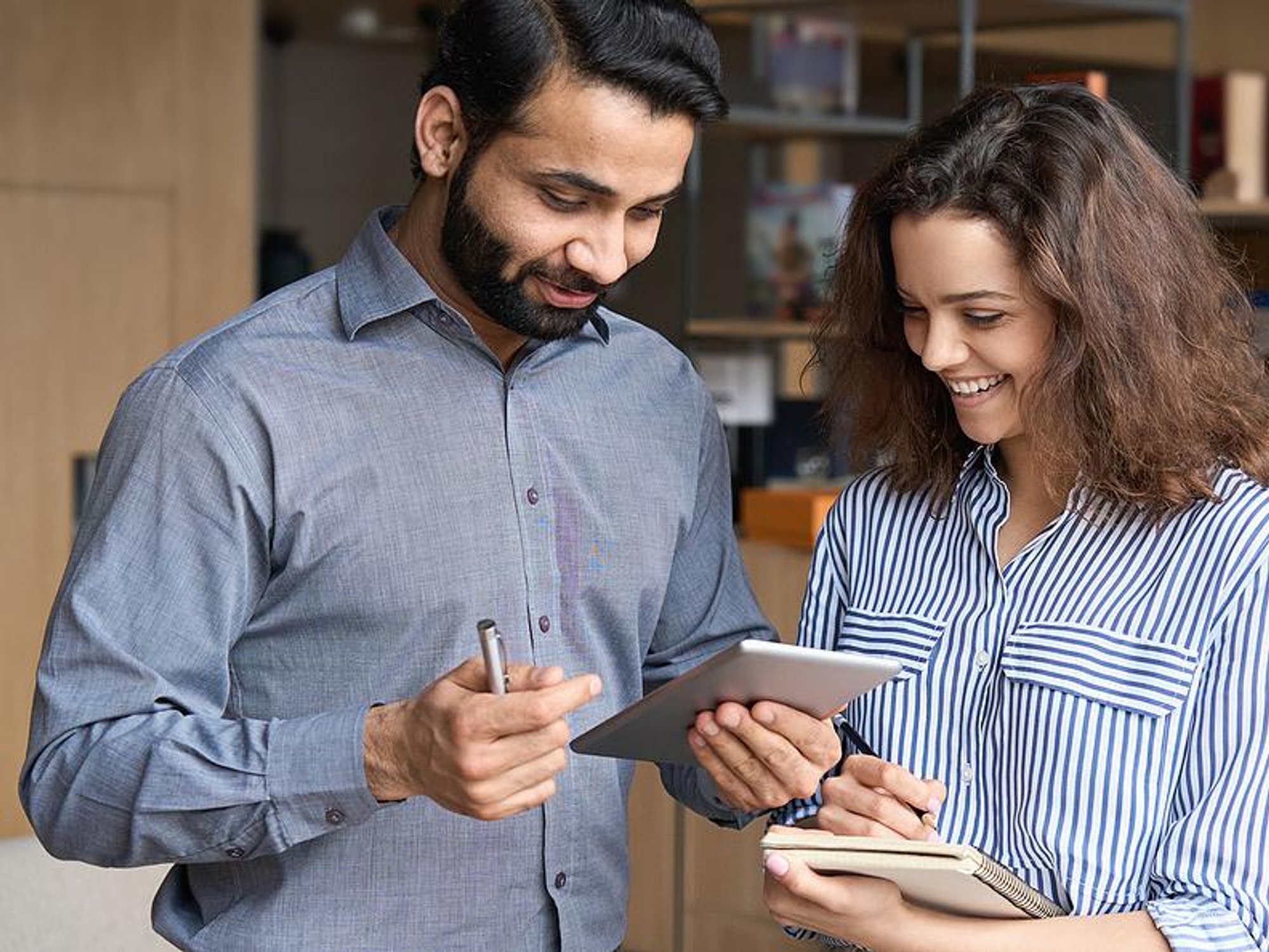 Incompetent boss talks with a coworker