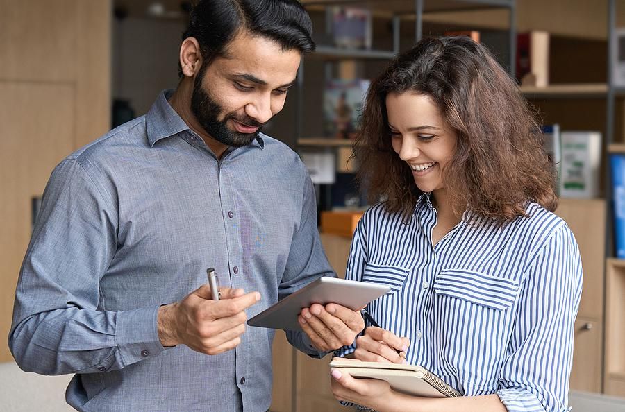 Incompetent boss talks with a coworker