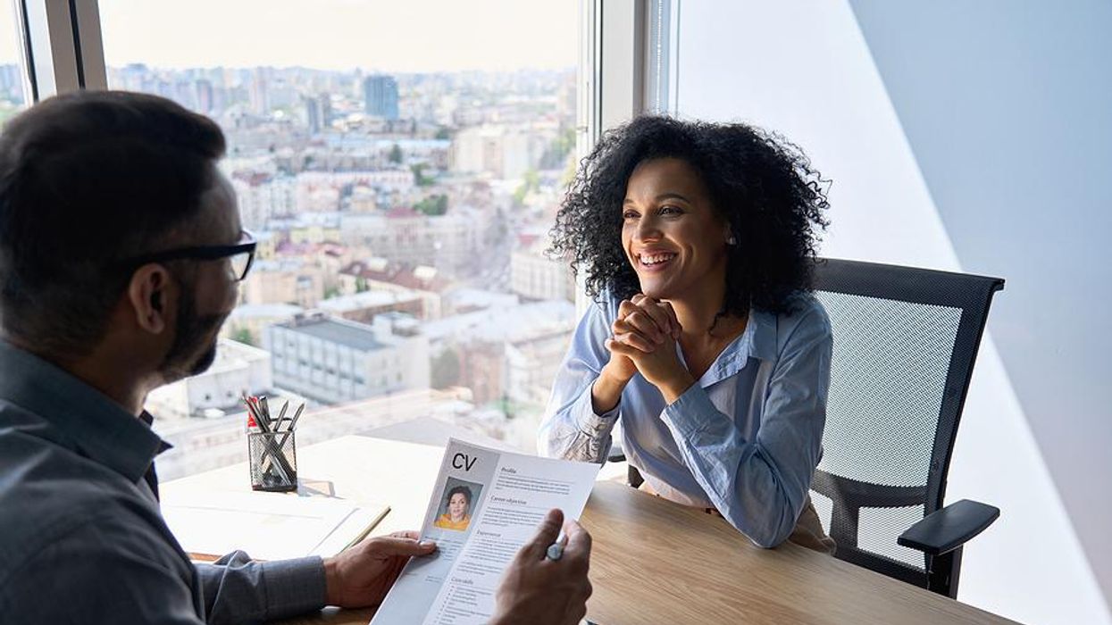 Interesting woman smiles during a job interview