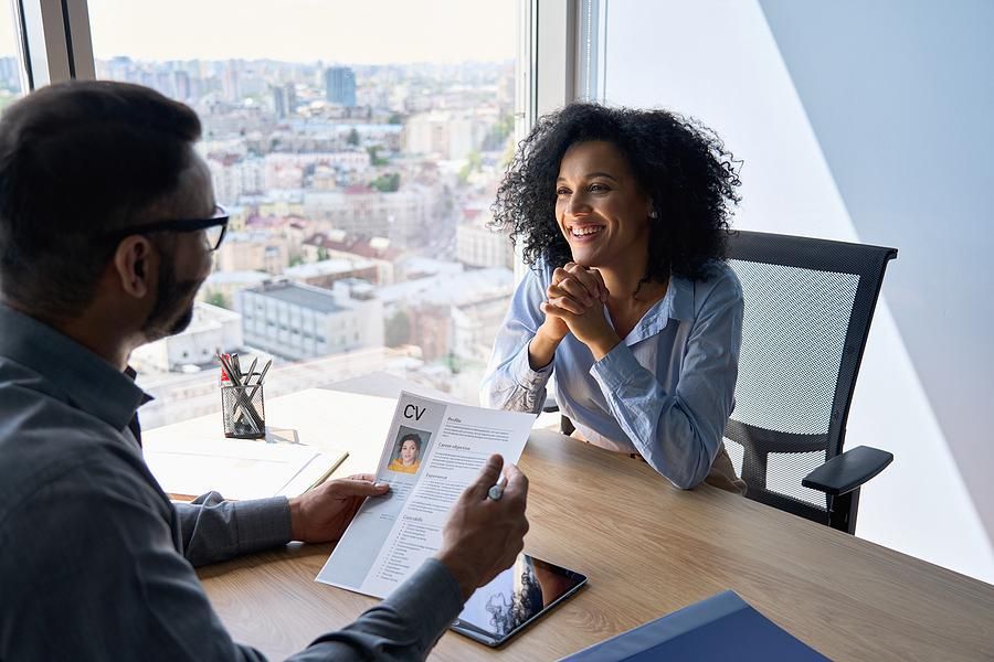 Interesting woman smiles during a job interview