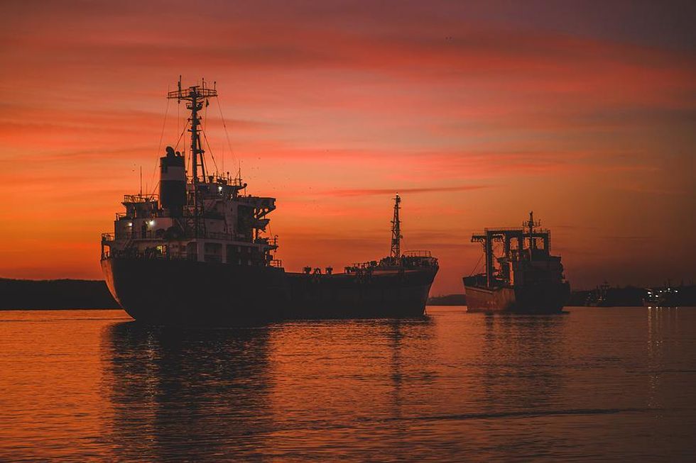International cargo ships at sunset