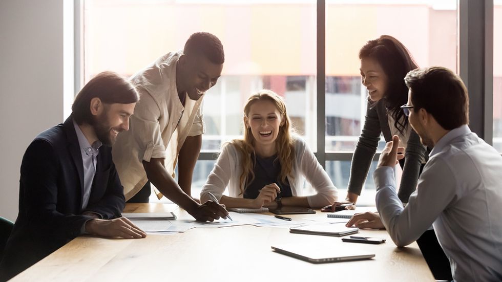 Interns work together on a project