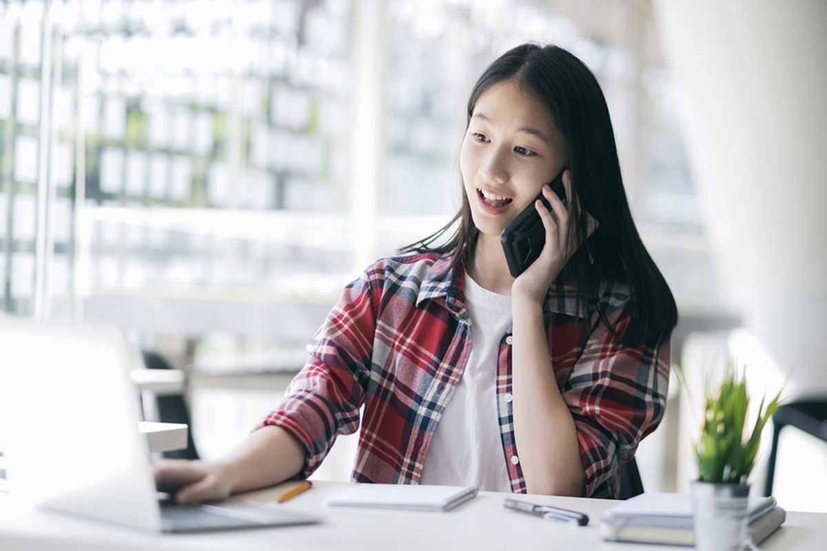 Job applicant using phone interview tips