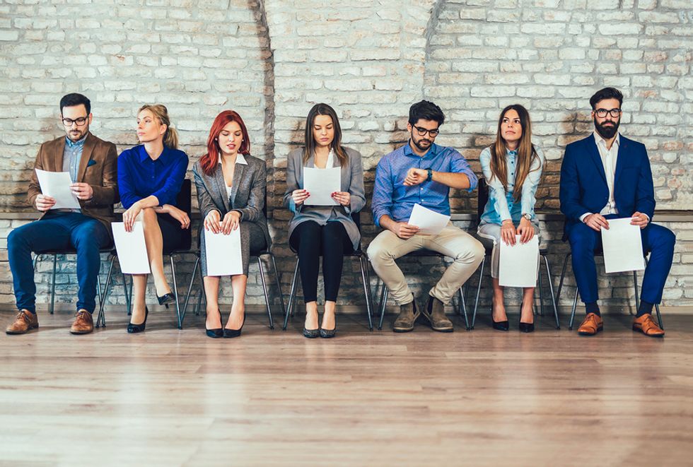 Job applicants preparing for a group interview