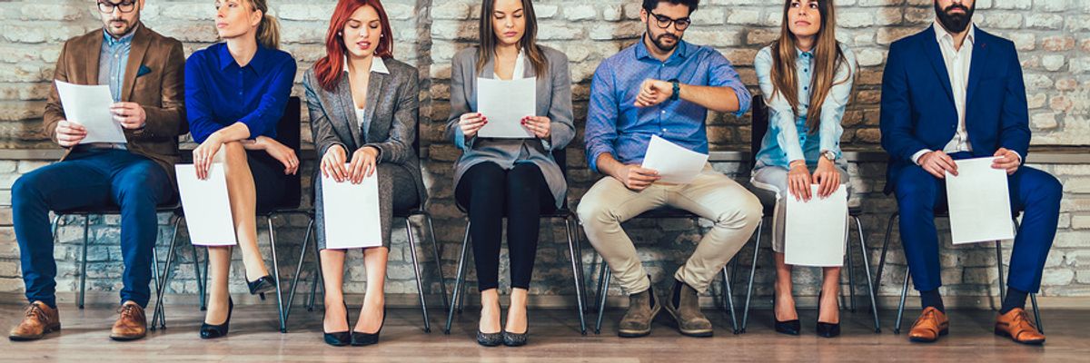 Job applicants preparing for a group interview