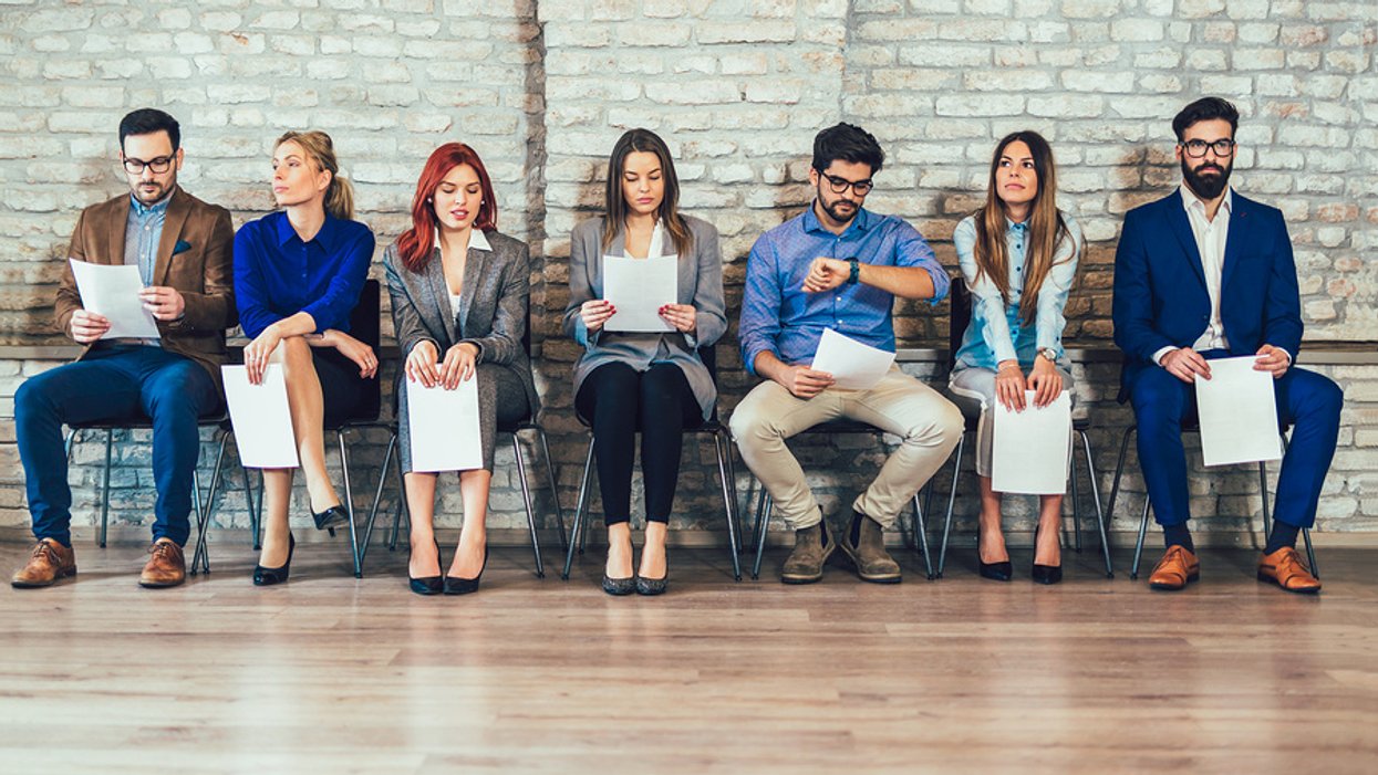 Job applicants preparing for a group interview
