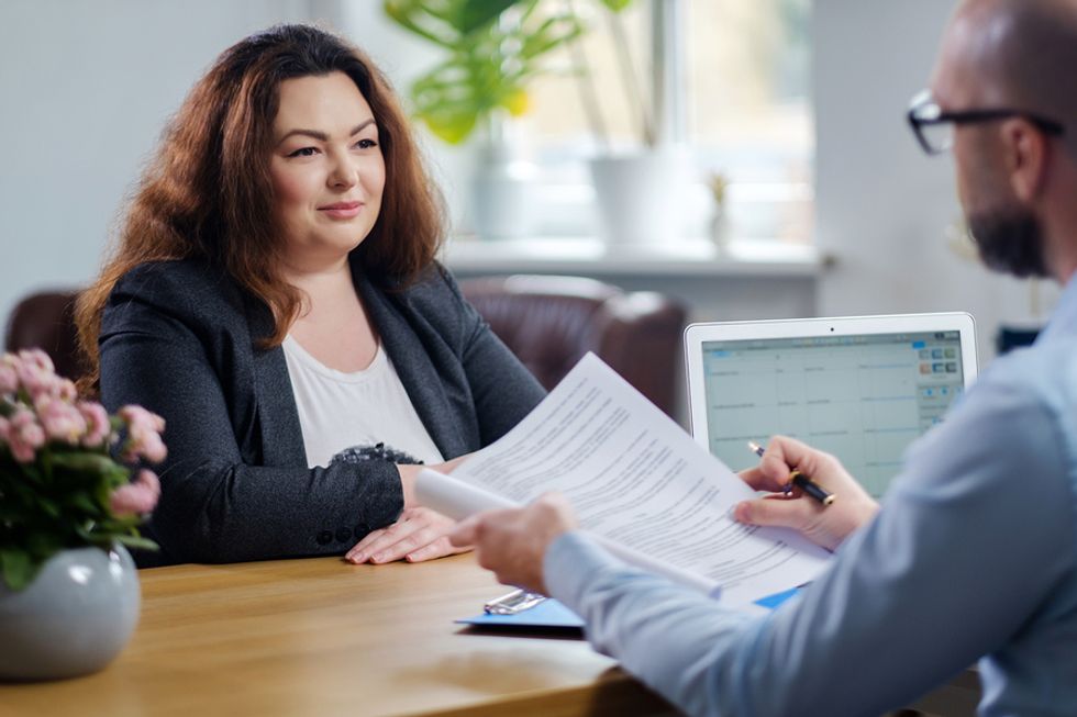 Job candidate explains why the employer should hire her in a job interview