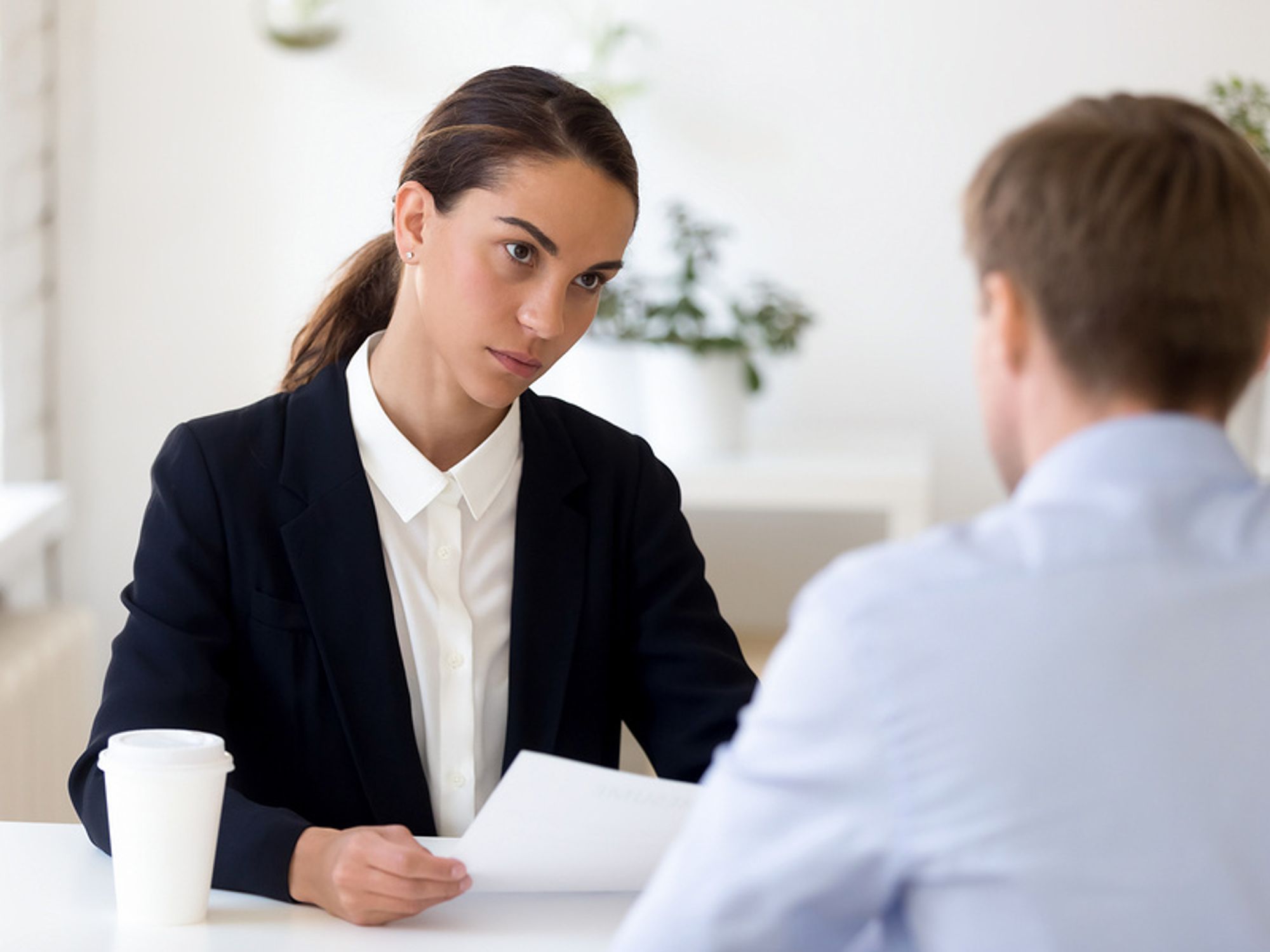 Job candidate looks desperate in his job search after asking a question during an interview