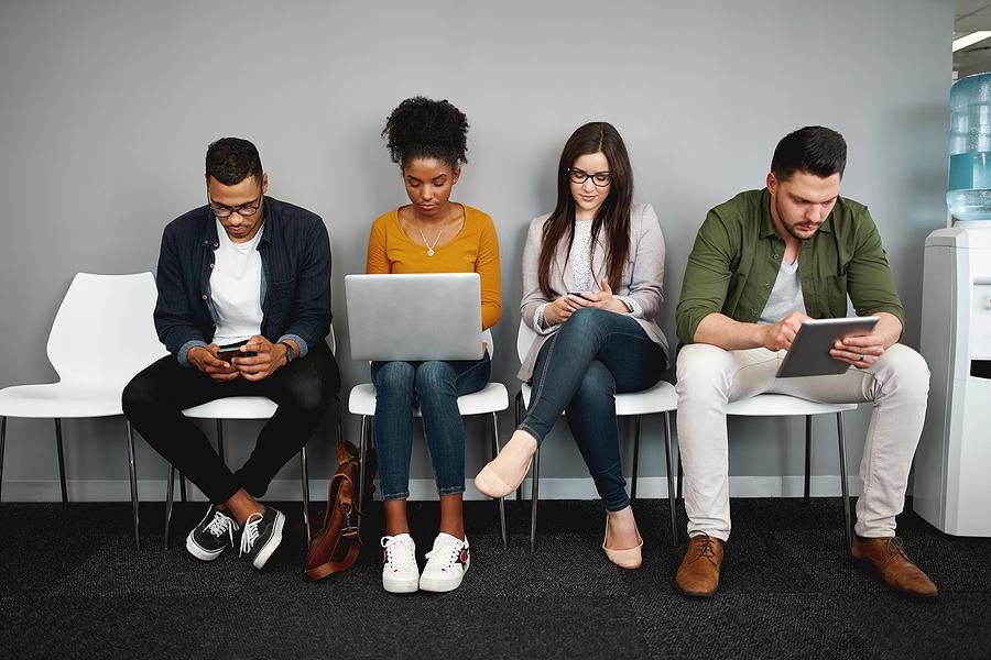 Job candidates prepare and wait for their job interviews