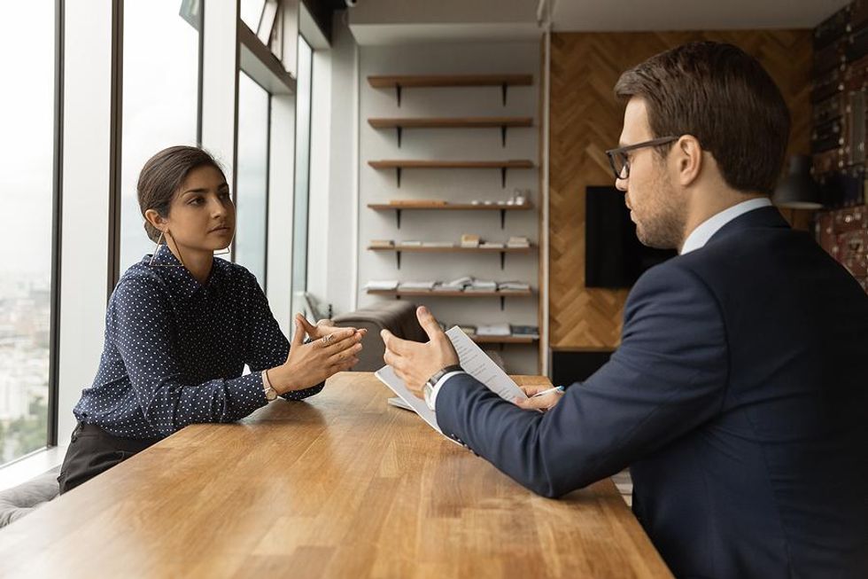 Job seeker discusses salary requirements with the hiring manager