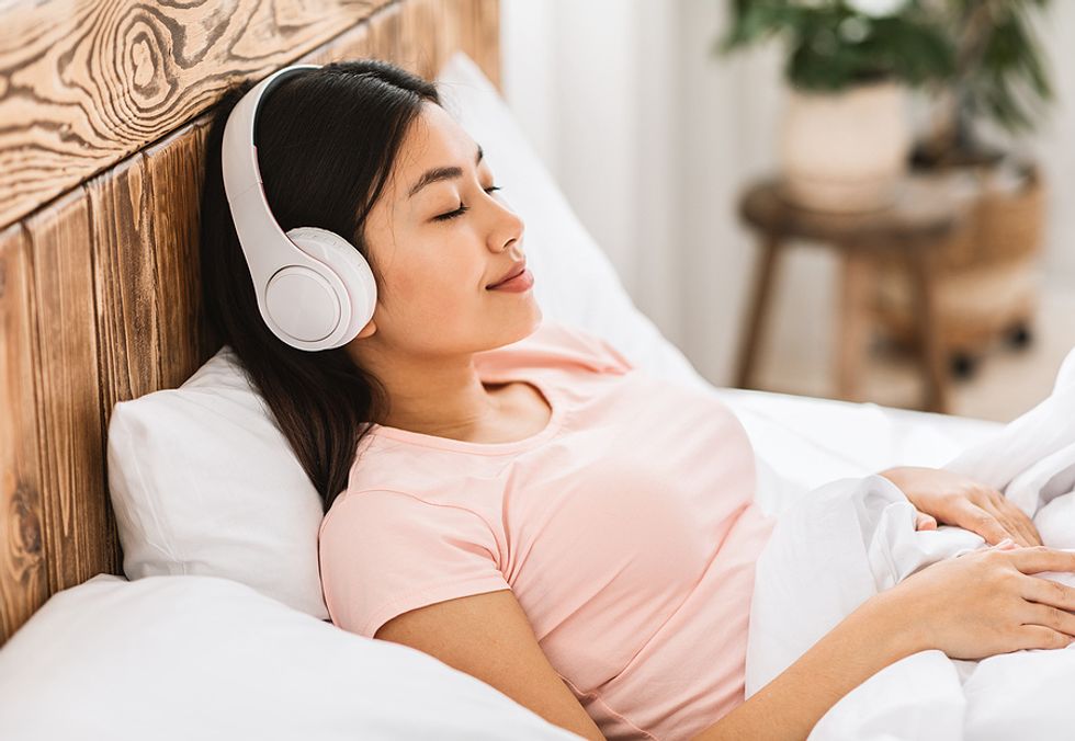 Job seeker listens to music and takes some time to relax in the hours leading up to her job interview