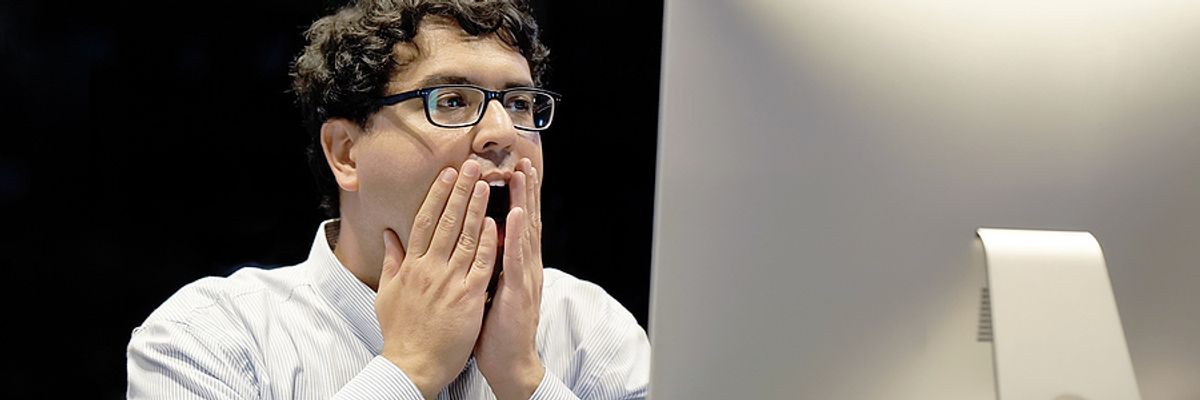 Job seeker looks on with regret after discovering cover letter mistakes.