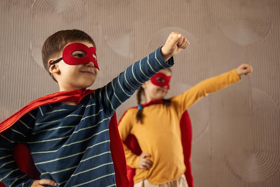 Kids dressed as superheroes