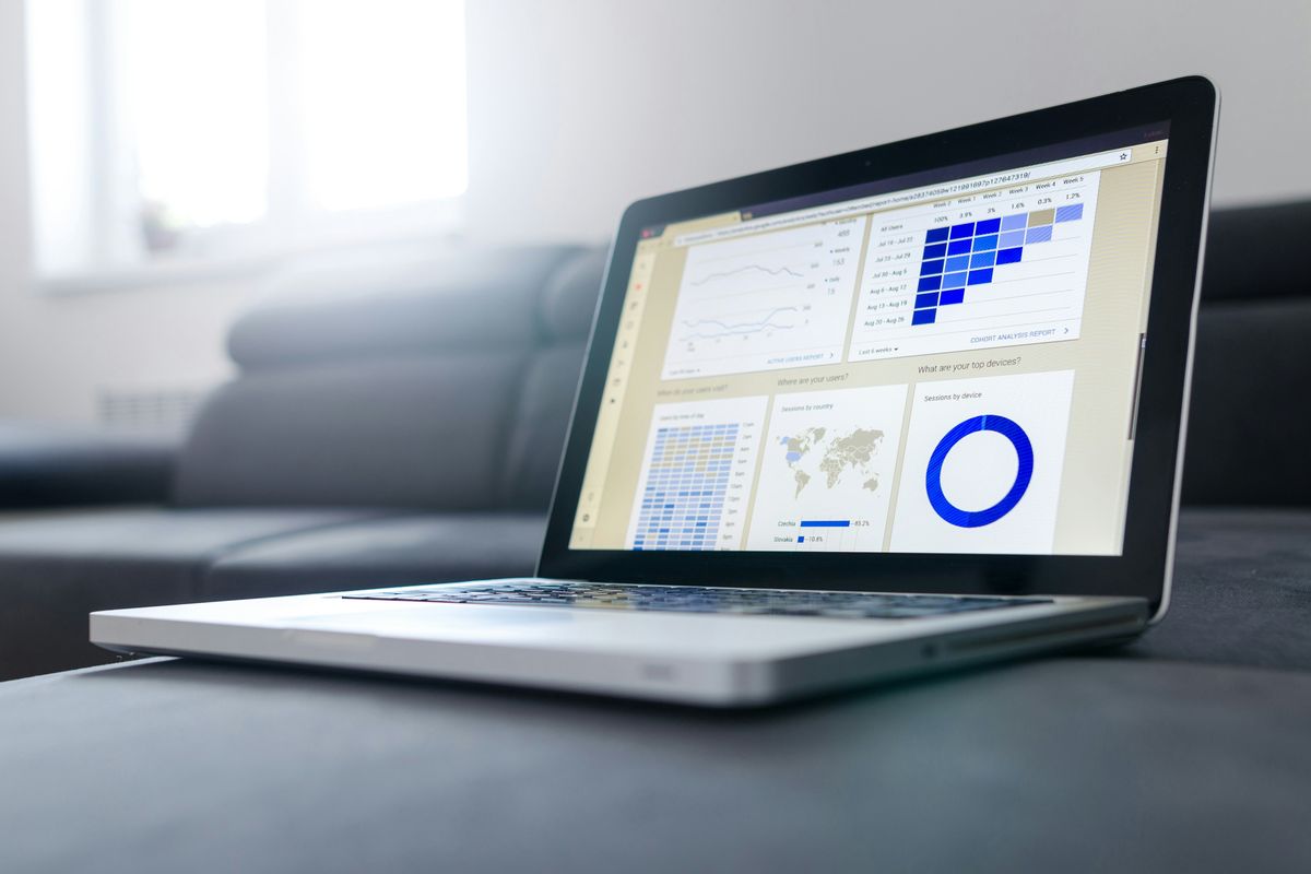 Laptop with data from operations and marketing