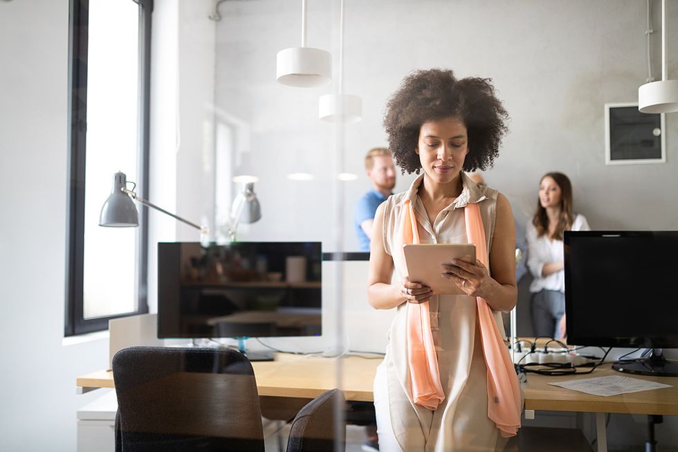 Leader looks at her notes