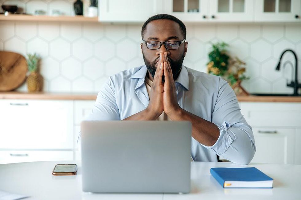 Leader on laptop uses AI (artificial intelligence) and his decision-making skills