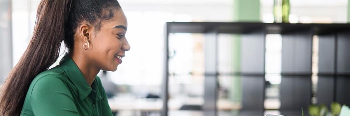 Leader talks to her remote employees on a Zoom call