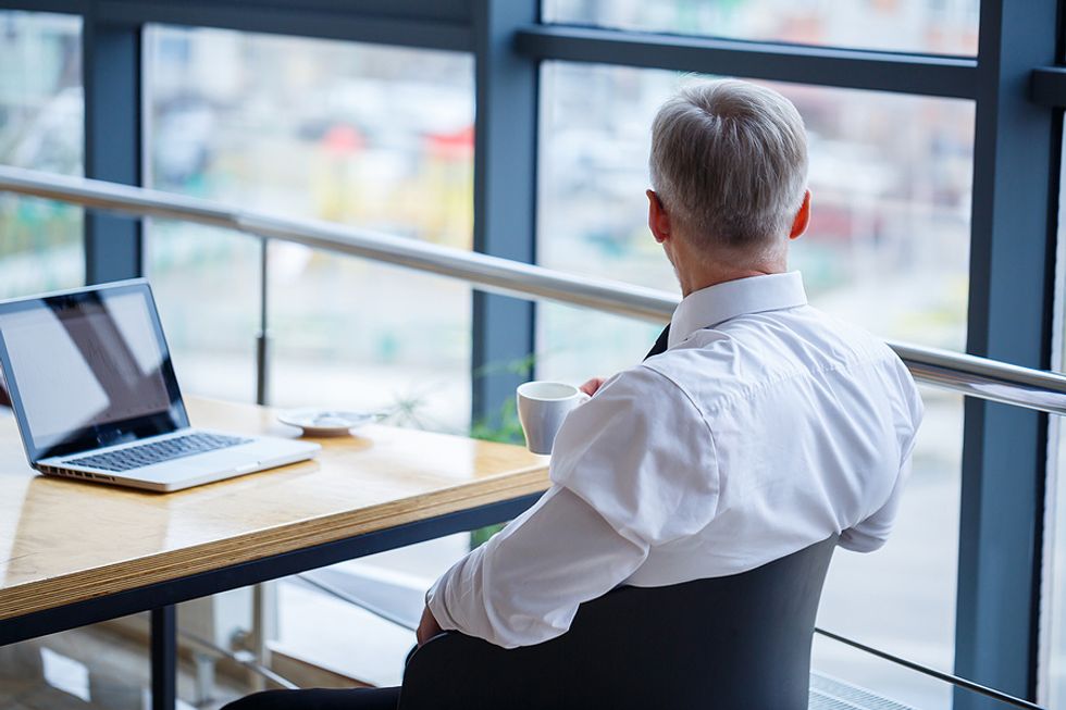 Male executive thinking about his habits