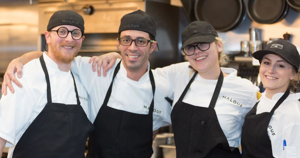 Malouf's culinary team poses for a photo.