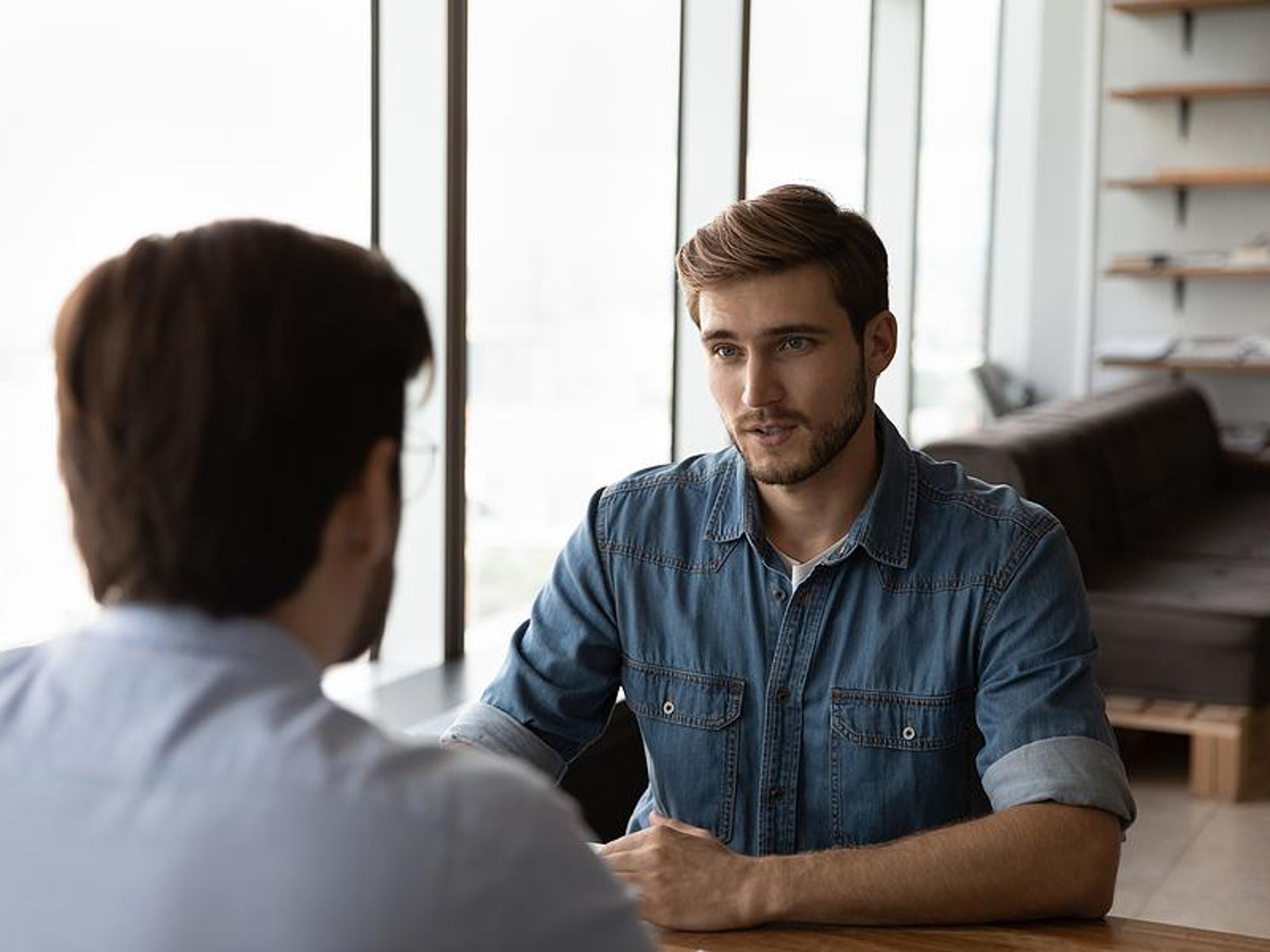 Man accepts a job offer during an interview