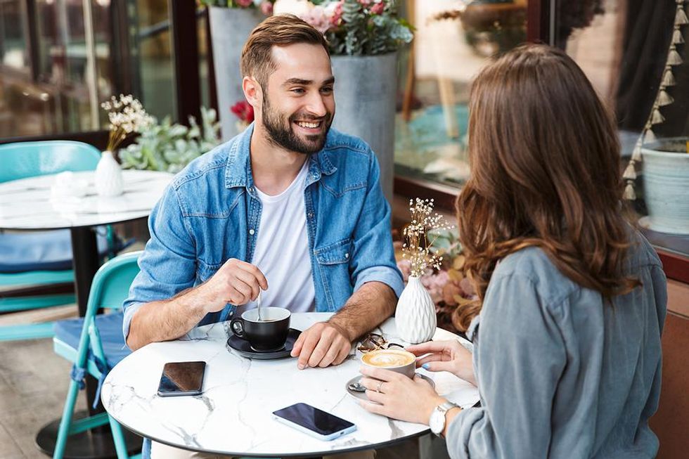 Man and woman on a date talk about work passions