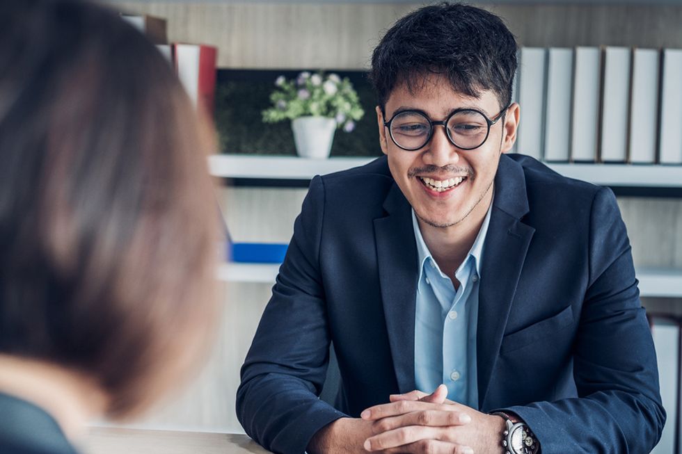 Man answers a question during a job interview