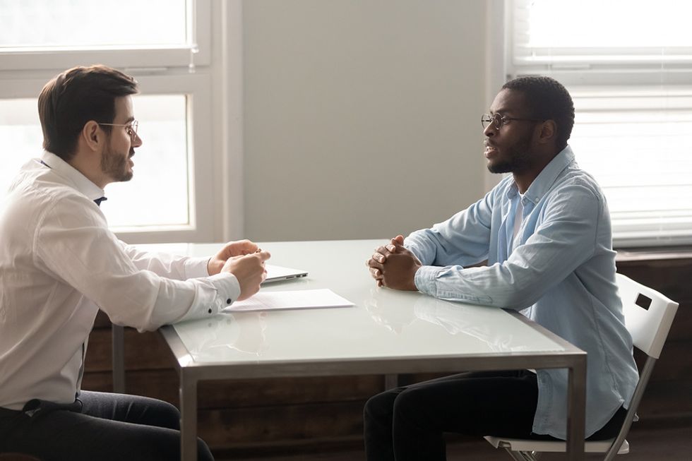 Man answers a question during a job interview