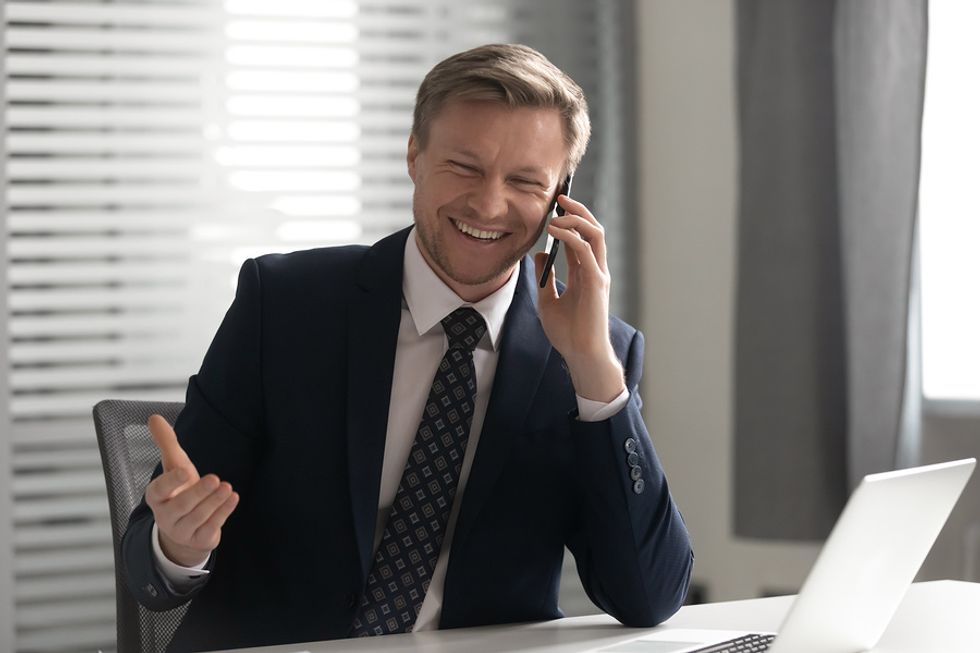 Man answers a question during his phone interview