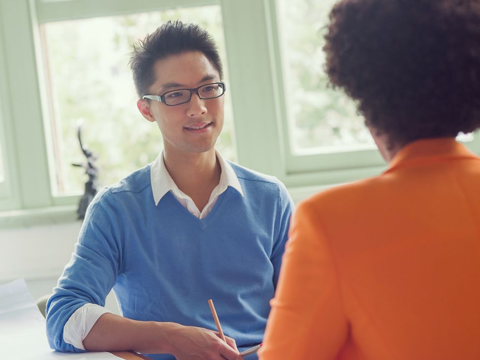 Man answers a question in his job interview