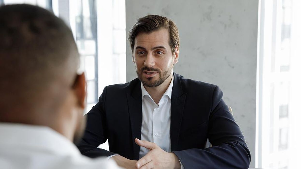 Man answers interview question about how he handles a heavy workload