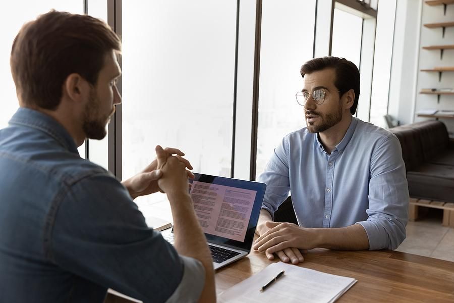 Man answers the question, "Tell me about yourself," in a job interview.