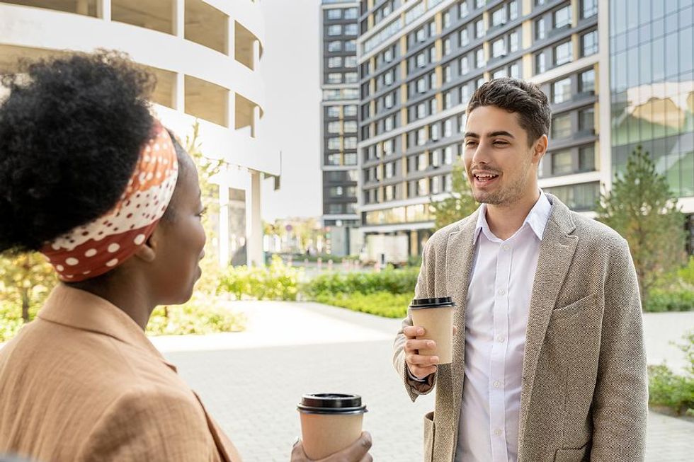 Man asks a question during an informational interview