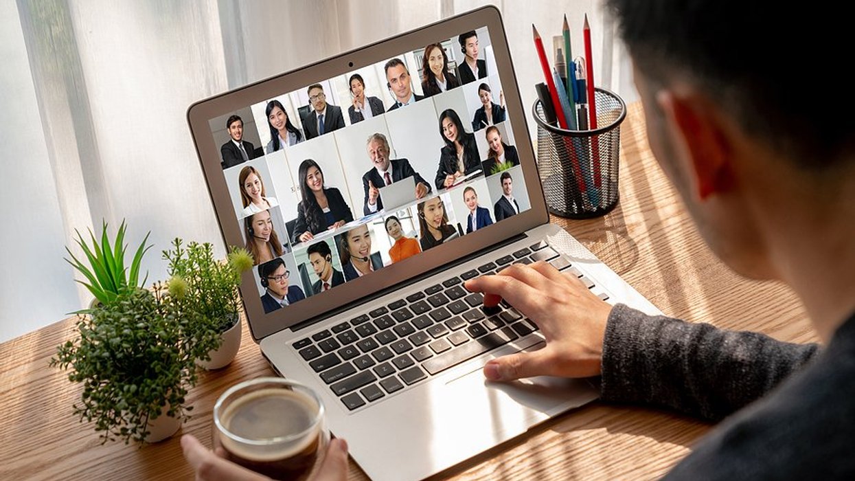 Man attends a remote workshop on his laptop