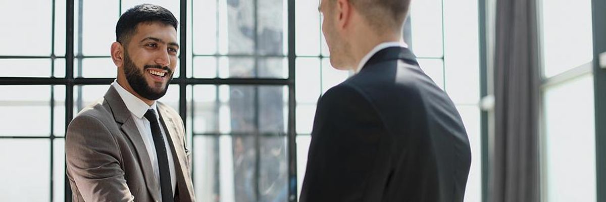 Man builds his professional network at work