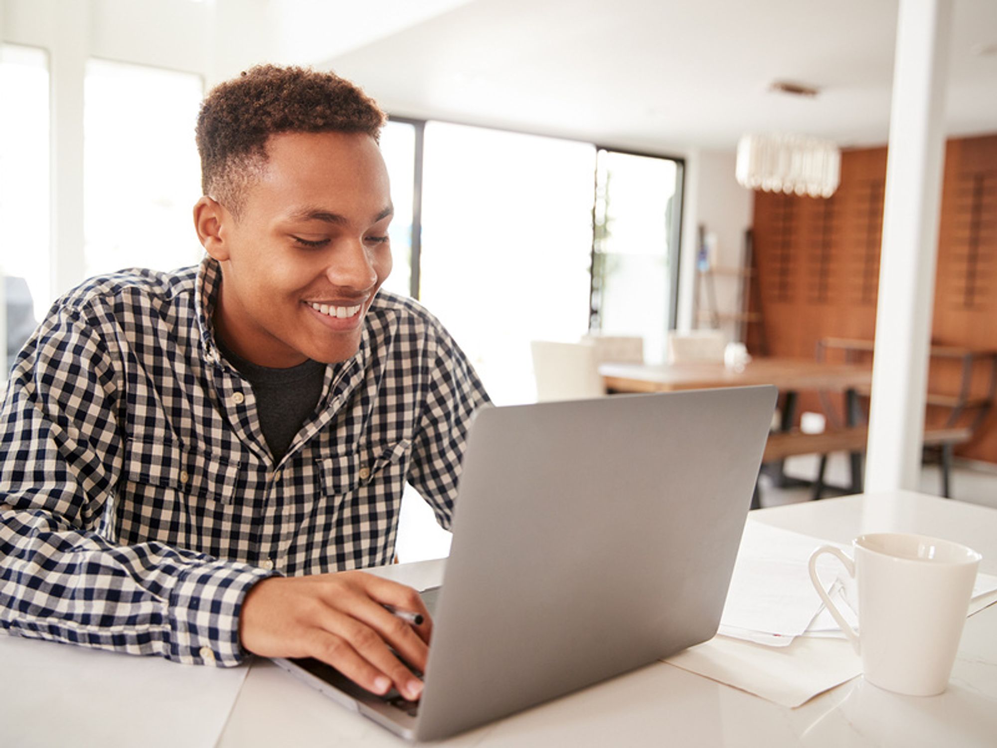 Man changing his resume fluff to marketable facts and results