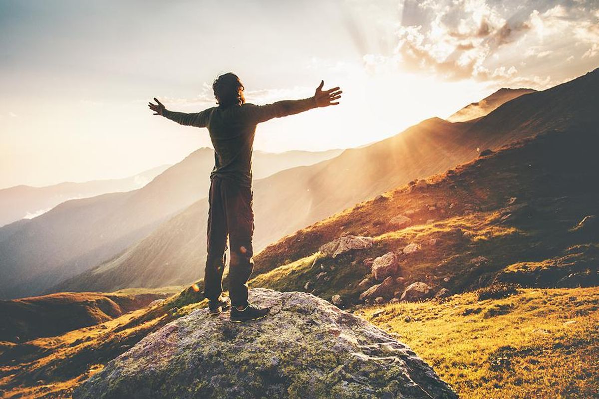 Man feels inspired by the mountains