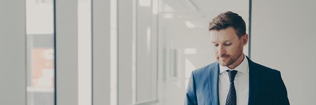 Man gets a call from a recruiter at a bad time