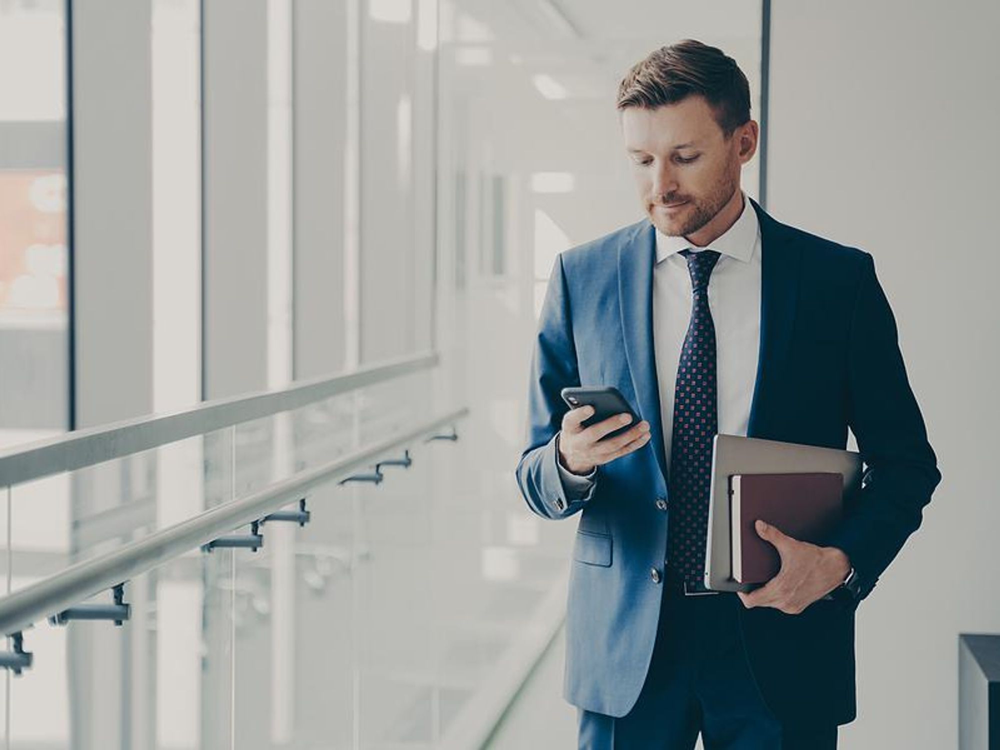 Man gets a call from a recruiter at a bad time