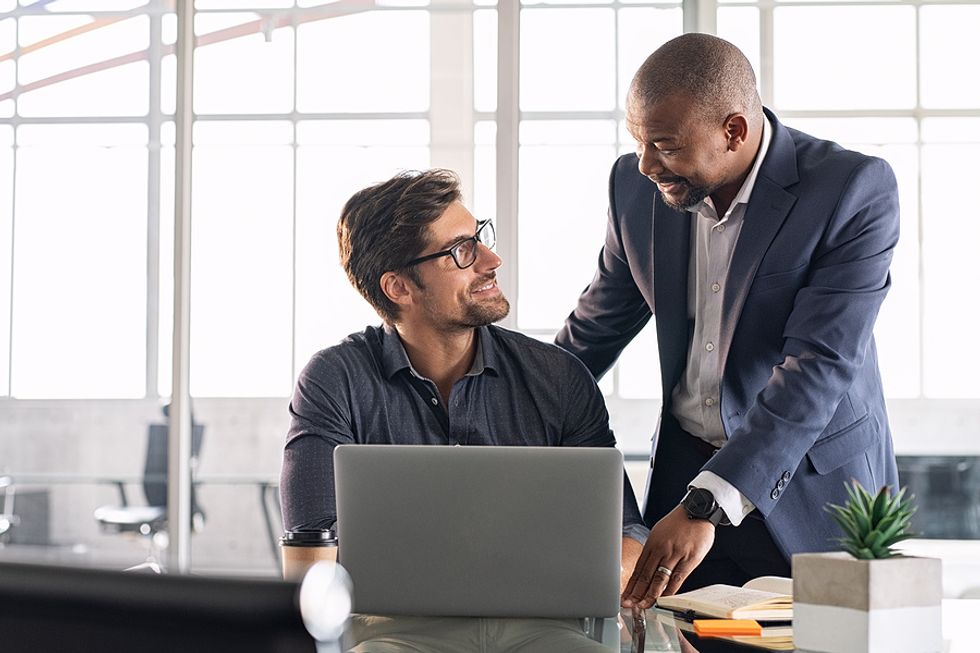 Man gets complimented by his boss after getting a raise