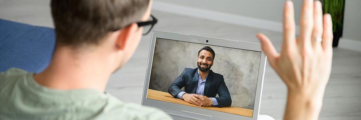 Man greets the employer before a job interview