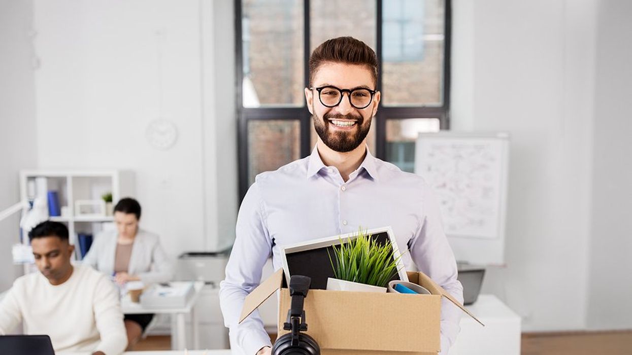Man happy about quitting his high-paying job for a lower-paying job