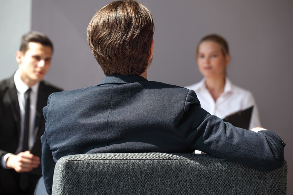 Man has negative body language during a job interview