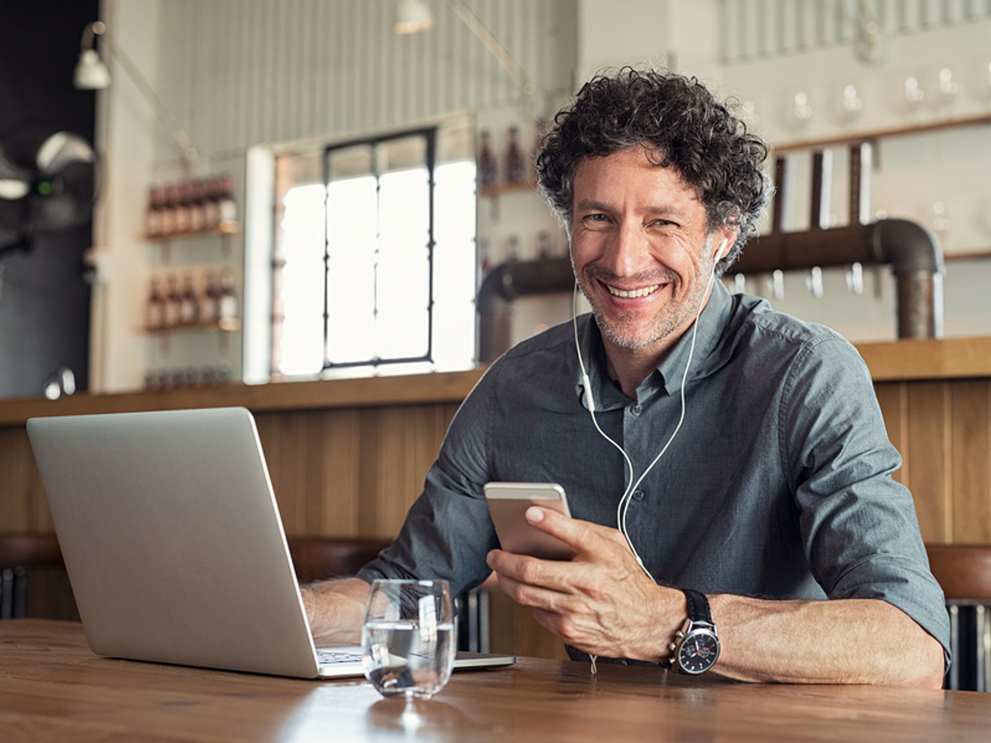 Man listening to podcast episodes
