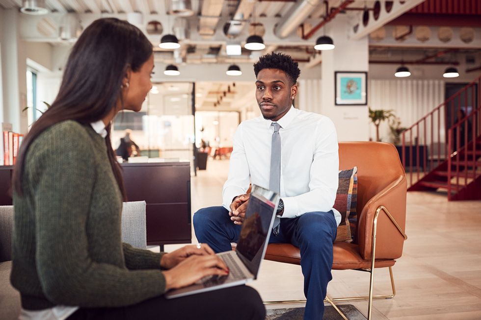 Man listens to an interview question