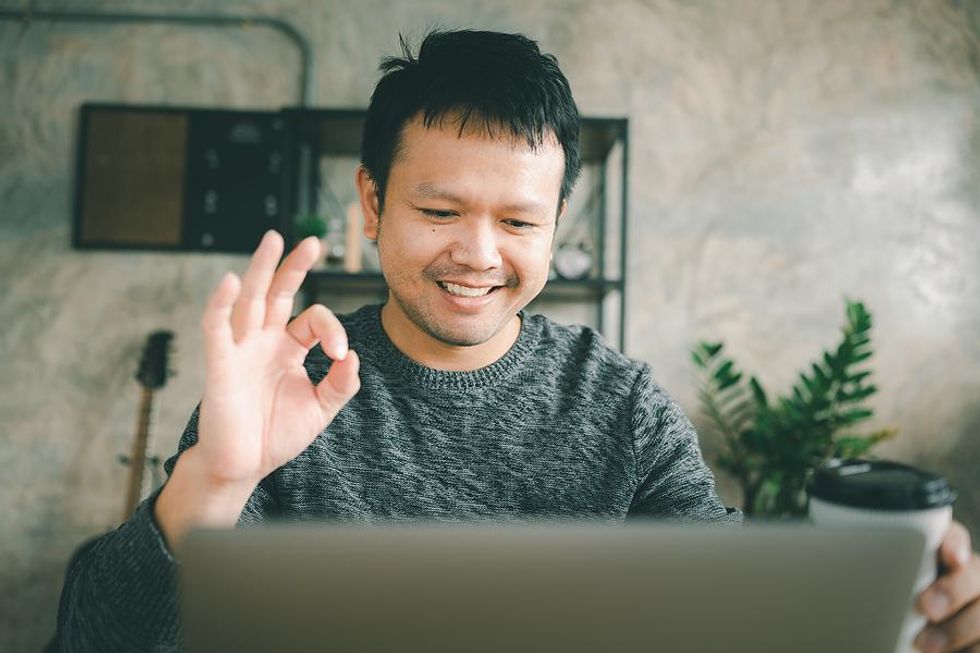 Man listens to and understands his colleague