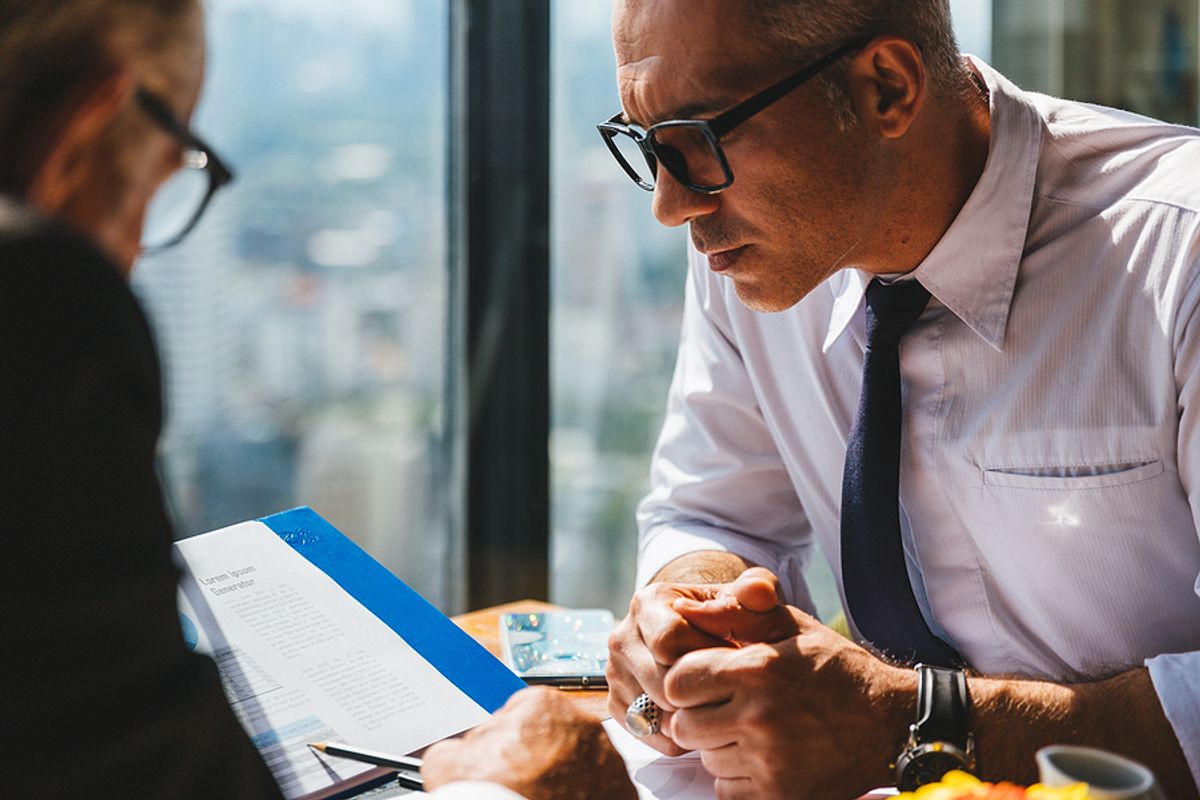 Man listens to his colleague