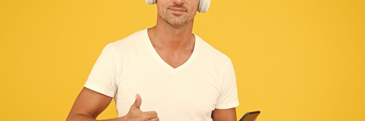 Man listens to inspiring podcast episodes